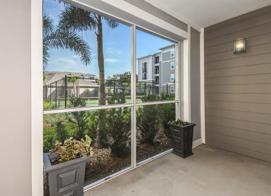 Sunroom Interior View at  Dunedin Commons Apartment Homes in Dunedin, Florida, FL