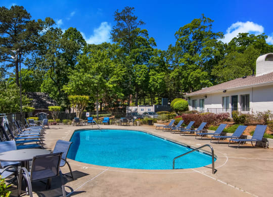 pool with trees at the background at Dunwoody Pointe in Sandy Springs, GA