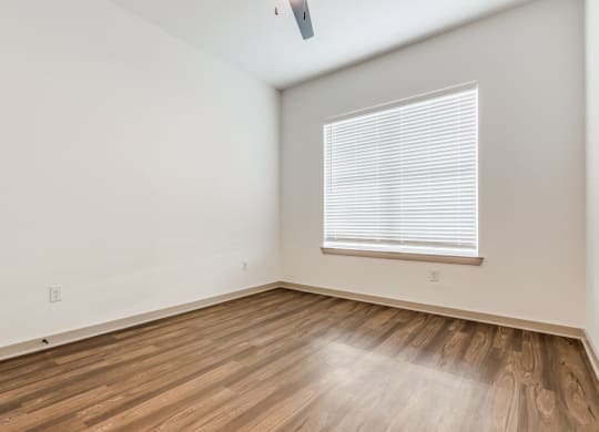 Serene Empty Bedroom A1 bedroom at Era Apartment in Denton, TX
