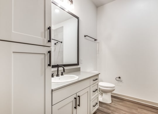 Modern Bathroom with Elegant Fixtures at Era Apartment in Denton, TX