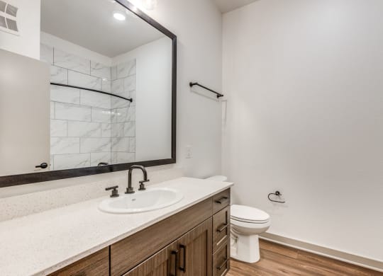 Elegant Bathroom Design with Modern Fixtures at Era Apartment in Denton, TX