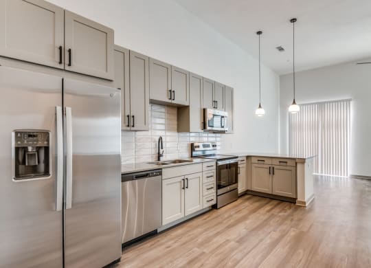 Open Concept Kitchen and Living Area at Era Apartment in Denton, TX
