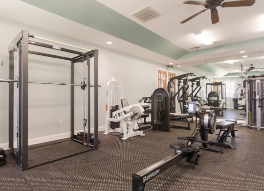Spacious fitness center with a variety of exercise equipment at Angel Landing apartments in Pensacola, FL