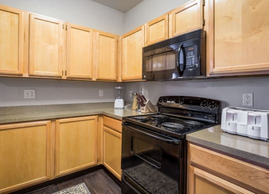 Model Unit Kitchen at Greensview Apartments in Aurora, Colorado, CO