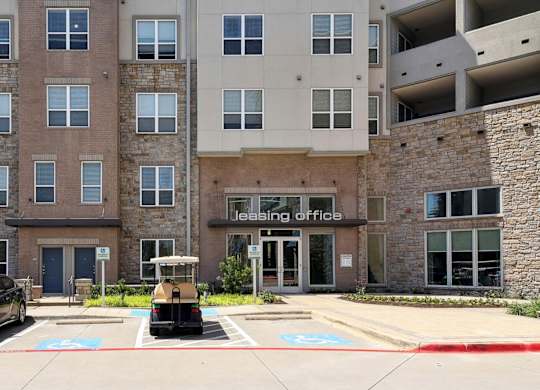Entrance to leasing office at GreenVue apartments in Richardson, TX