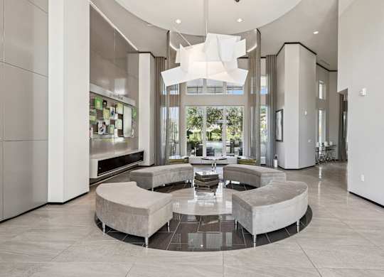 Lobby area with couches at GreenVue apartments in Richardson, TX