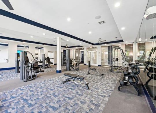 Modern fitness studio with state-of-the-art equipment at Harlow River Oaks apartments in Houston, TX