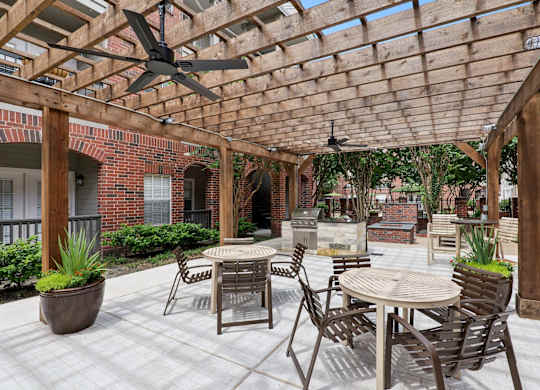 Grill/Dining Area at Inverness in Houston, TX