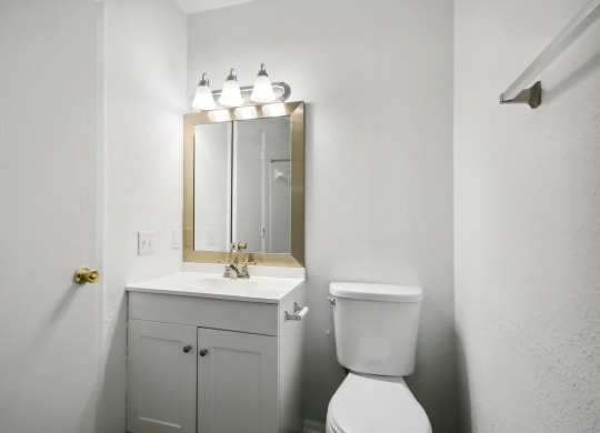 a bathroom with white cabinets at Johnston Creek Crossing in Charlotte, NC