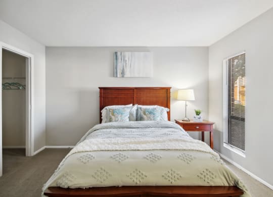 a bedroom with a bed and a window at Johnston Creek Crossing in Charlotte, NC