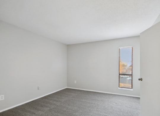 bedroom with white walls at Johnston Creek Crossing in Charlotte, NC