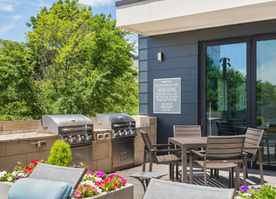 two bbq grills on the patio at Knox Heights in Dallas, TX