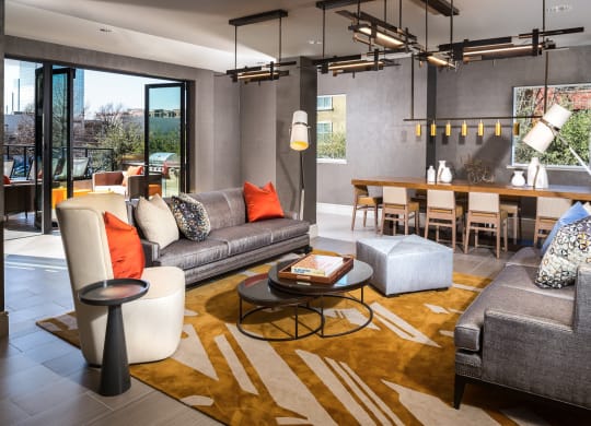 clubhouse with couches and coffee table at Knox Heights in Dallas, TX