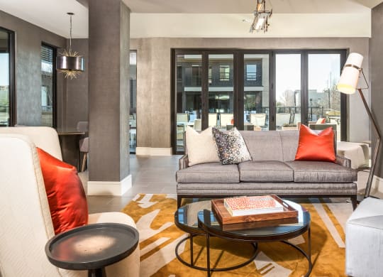 clubhouse with couches and coffee table at Knox Heights in Dallas, TX