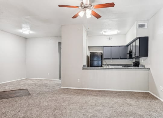 Spacious living room area at Laurels of Sendera apartments in Arlington, TX