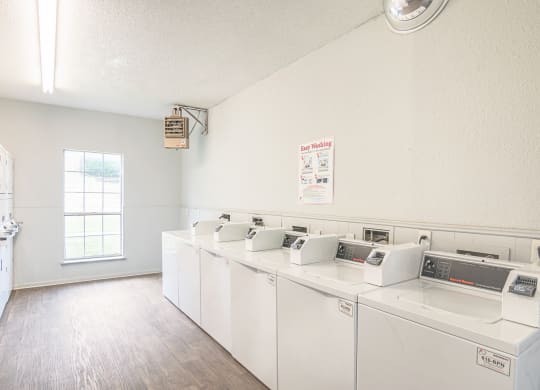 Laundry Room at Oaks of Denton in Denton, TX