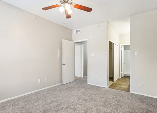 Comfortable bedroom with closet space at Laurels of Sendera apartments in Arlington, TX