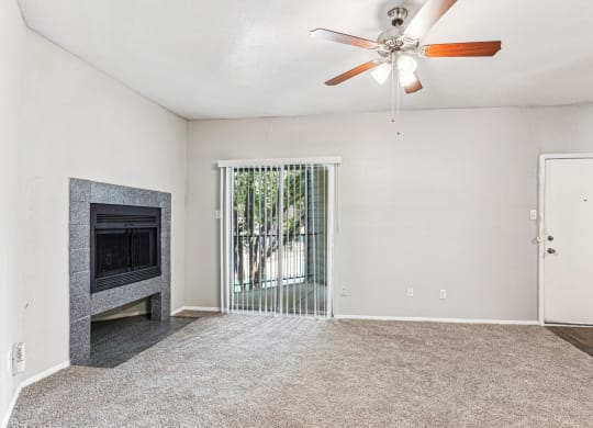 Bright and inviting living room with ample natural light at Laurels of Sendera apartments in Arlington, TX