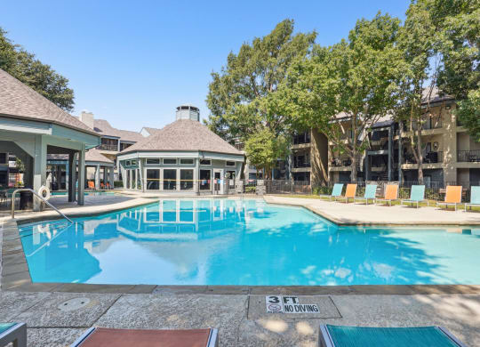 Sun-drenched pool at Laurels of Sendera apartments in Arlington, TX