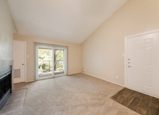 Model Living Room with Fireplace at Vista Crossing Apartments in San Antonio, TX