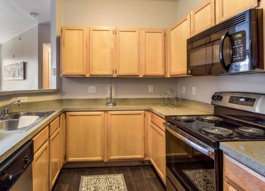 Model Unit Kitchen at Greensview Apartments in Aurora, Colorado, CO