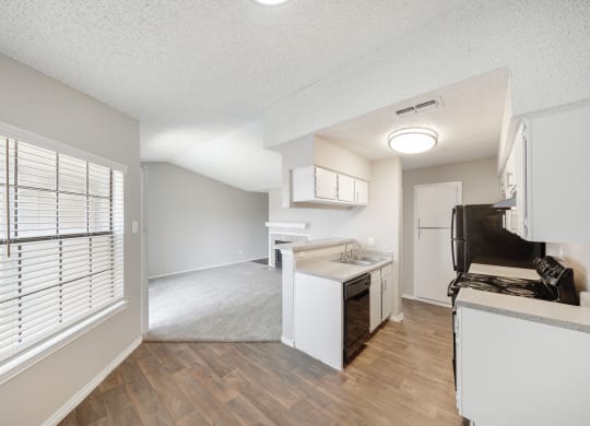 Kitchen and Dining Room at Polaris Apartment Homes in Irving, Texas, TX