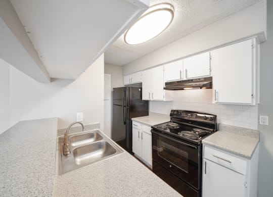 Unit Kitchen at Polaris Apartment Homes in Irving, Texas, TX