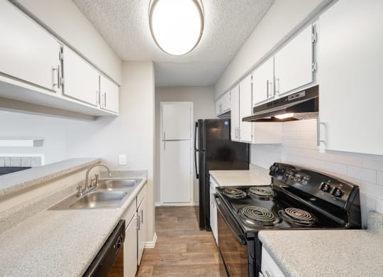 Kitchen at Polaris Apartment Homes in Irving, Texas, TX