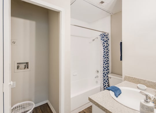 W/D Connections and Bathroom at Lakeridge Apartment Homes in Irving, Texas, TX