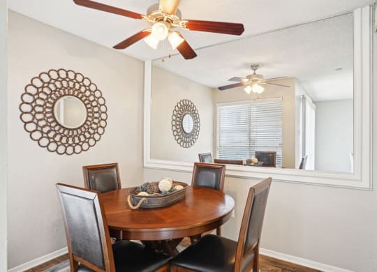 Model A2 floor plan dining room with a table and ceiling fan Noel on The Parkway in Dallas, TX
