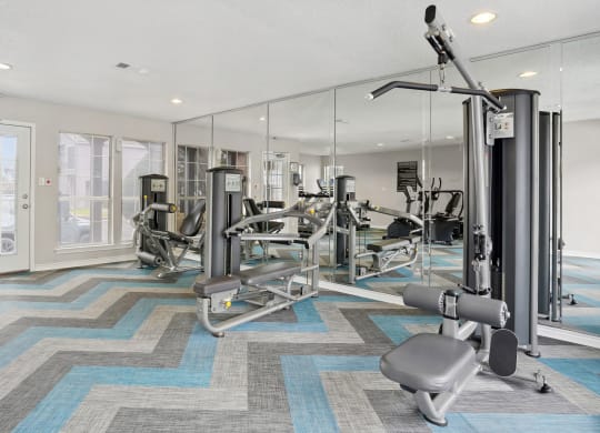 Fitness Center with strength machines at Noel on the Parkway in Dallas, TX