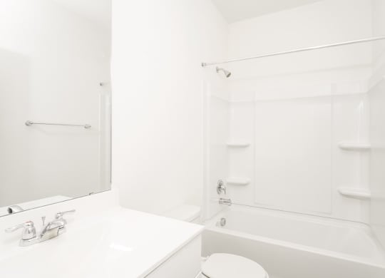 2nd bathroom with a bathtub and a sink at Beacon at Clinton Corners in Dade City, FL