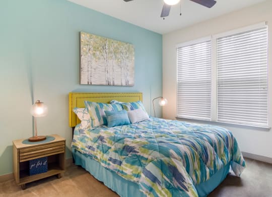 Bedroom with a big window at Oakleaf Plantation in Jacksonville, FL