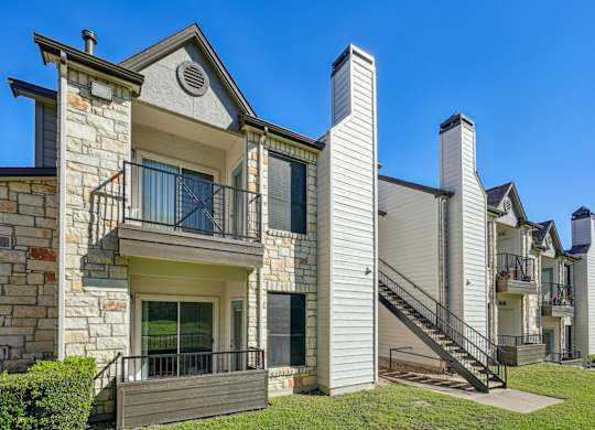 Exteriors of our cozy apartments at On the Green apartments in Austin, TX