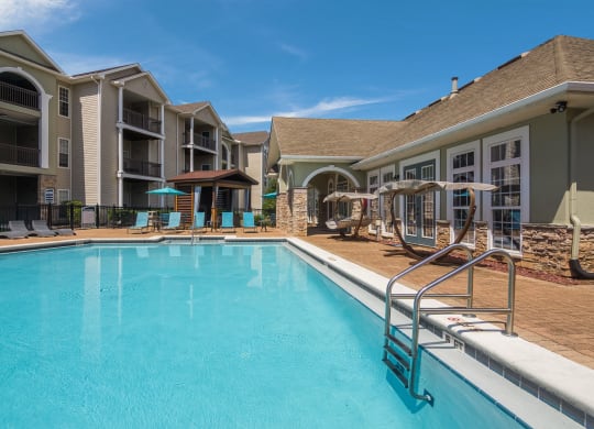 Refreshing swimming pool at Angel Landing apartments in Pensacola, FL