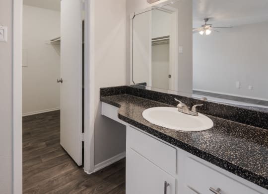 Bathroom Sink and Closet at Preston Villas Apartment Homes, Dallas, Texas, TX