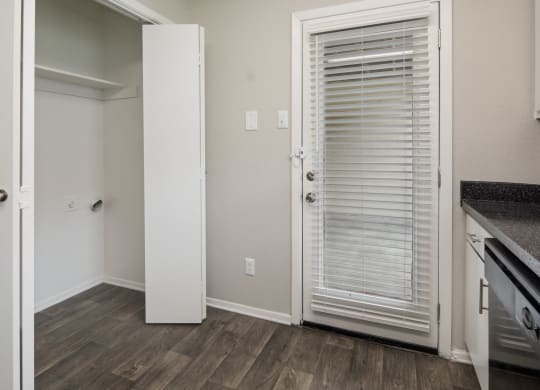 Laundry Closet in Kitchen at Preston Villas Apartment Homes, Dallas, Texas, TX
