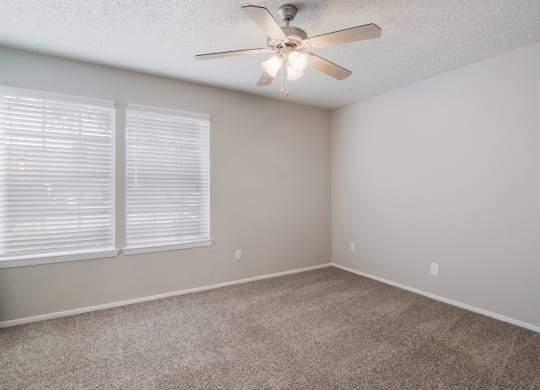 Bedroom with Ceiling Fan at Preston Villas Apartment Homes, Dallas, Texas, TX