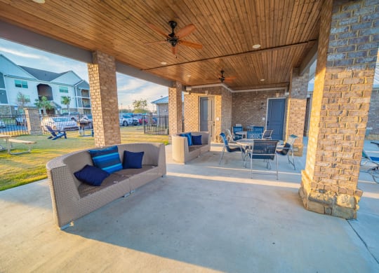 Shaded Outdoor Area by Pool at Parkside Grand Apartments in Pensacola, FL
