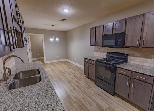 Kitchen Area at Parkside Grand Apartments in Pensacola, FL