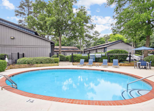 Inviting and refreshing pool area at Pine Village North in Smyrna, GA