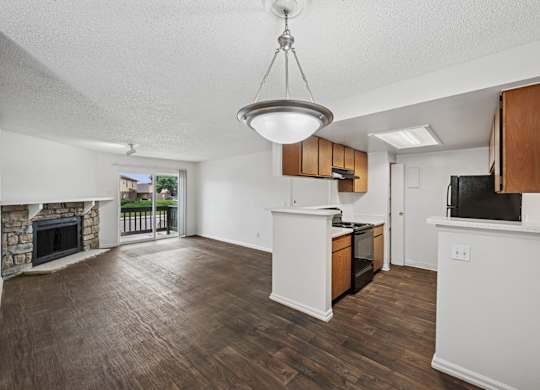 Reflections at Cherry Creek in Aurora, CO kitchen and living room