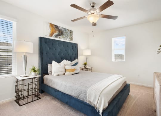Bedroom with blue mattress frame at Beacon at Ashley River Landing in Summerville, SC