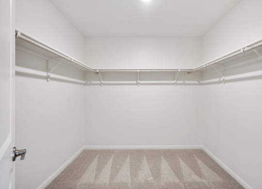 an empty room with white walls and carpet  at Beacon at Ashley River Landing, Summerville, SC 29485