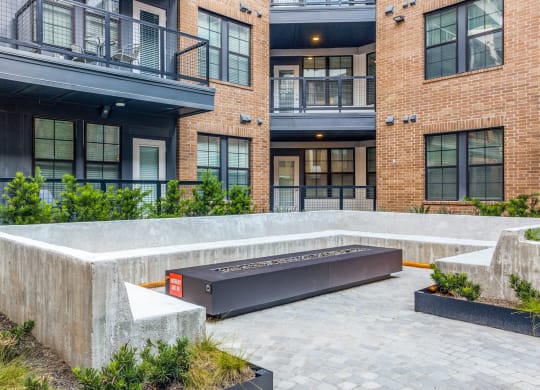 Cozy Fire Pit Area for Evening Gatherings and Relaxation at St. Elmo Apartment in Austin, TX