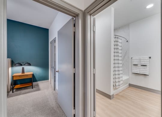 The entries for bedroom and bathroom of B6 Floor Plan at St. Elmo Apartment in Austin, TX