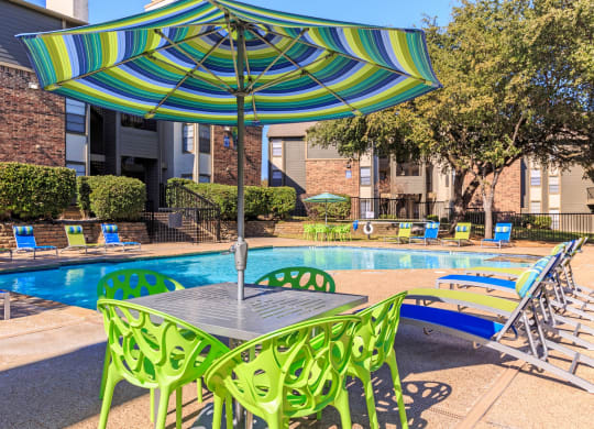 Outdoor table area  at The Summit Apartments in Mesquite, Texas, TX