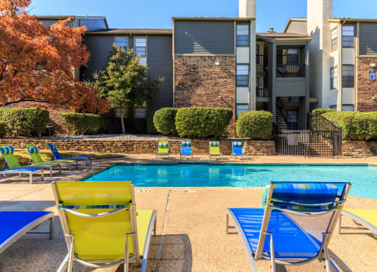 Outdoor pool area  at The Summit Apartments in Mesquite, Texas, TX