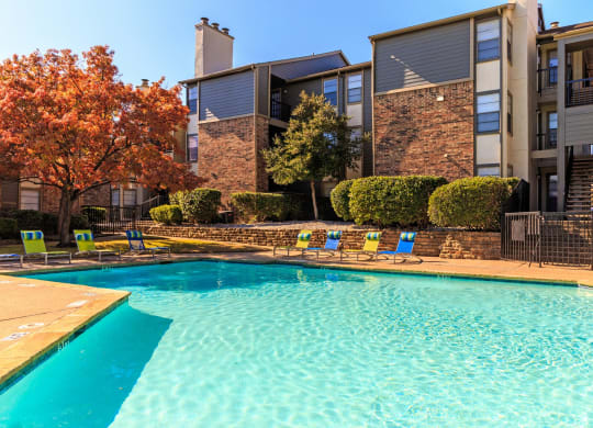 Swimming pool  at The Summit Apartments in Mesquite, Texas, TX