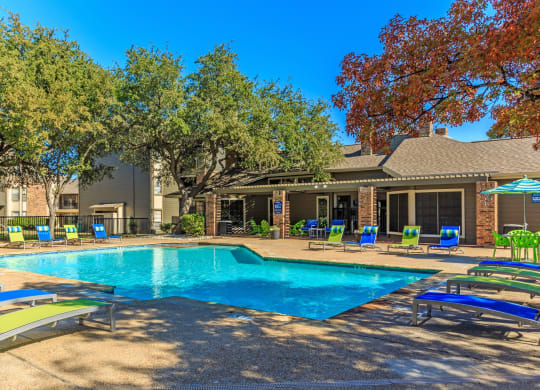 Outdoor swimming pool  at The Summit Apartments in Mesquite, Texas, TX